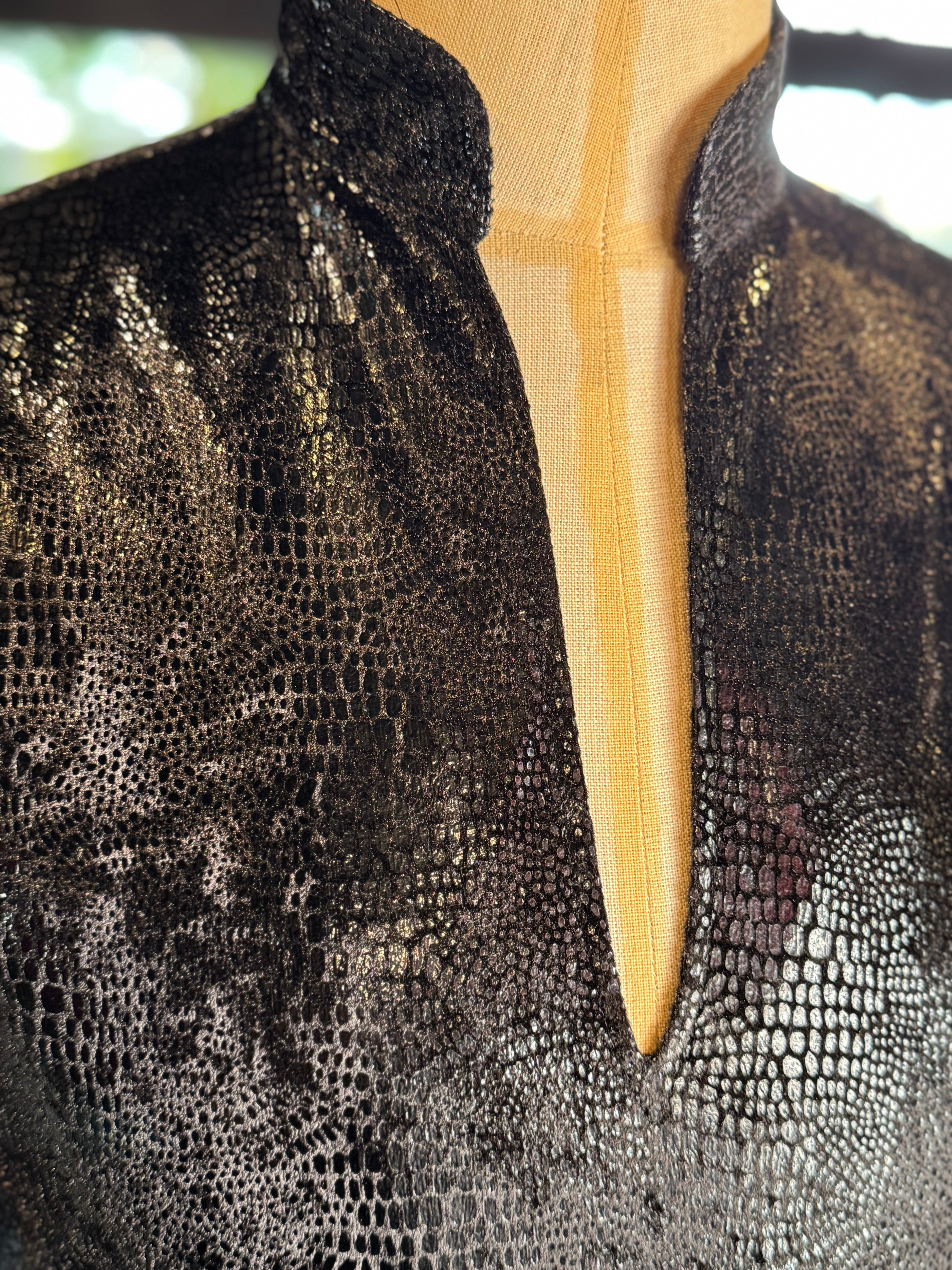 Túnica terciopelo reptil