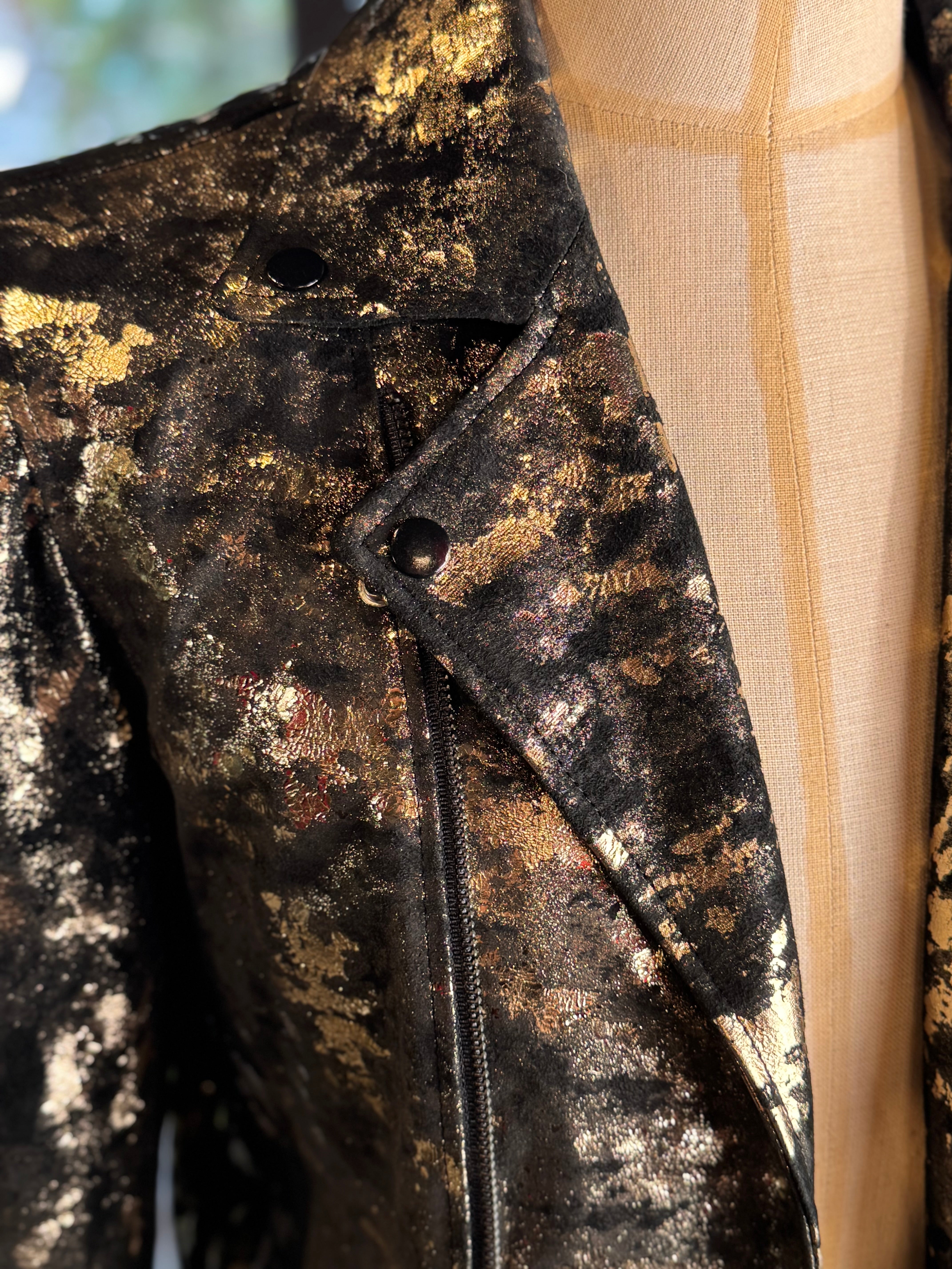 Chamarra mármol oro