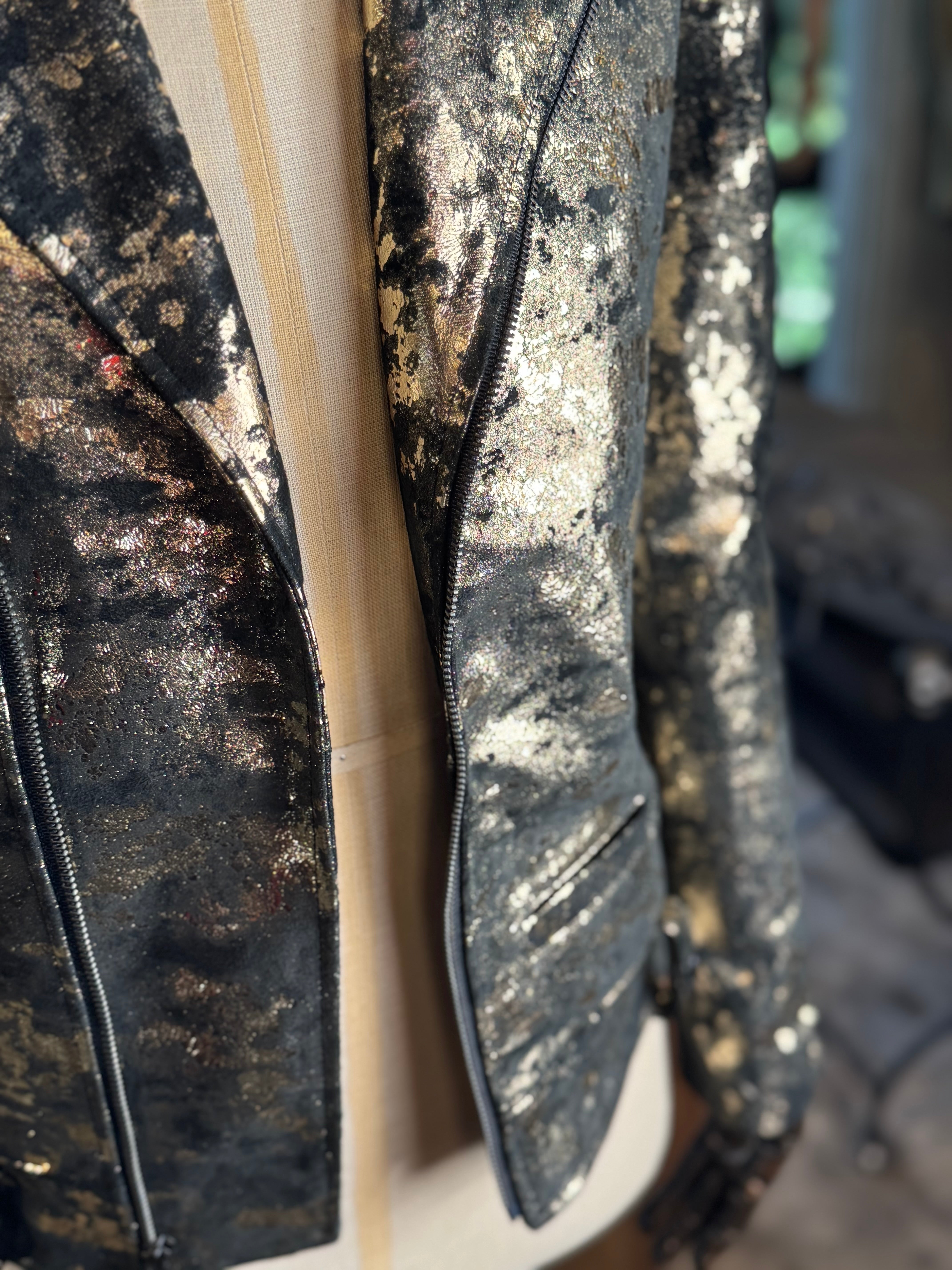 Chamarra mármol oro