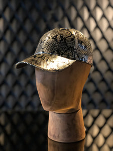 Gorra vinipiel serpiente oro