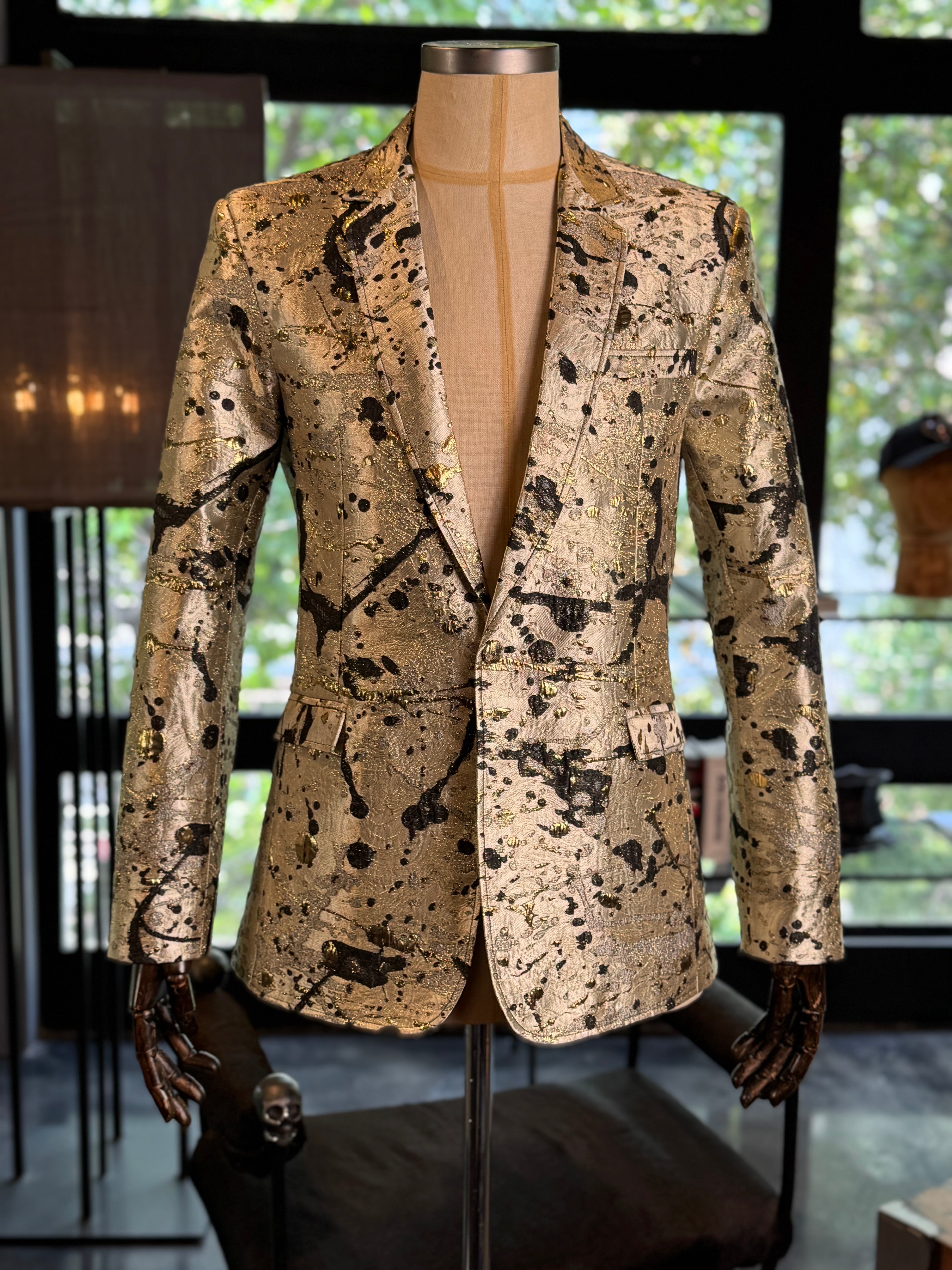 Saco dorado manchas