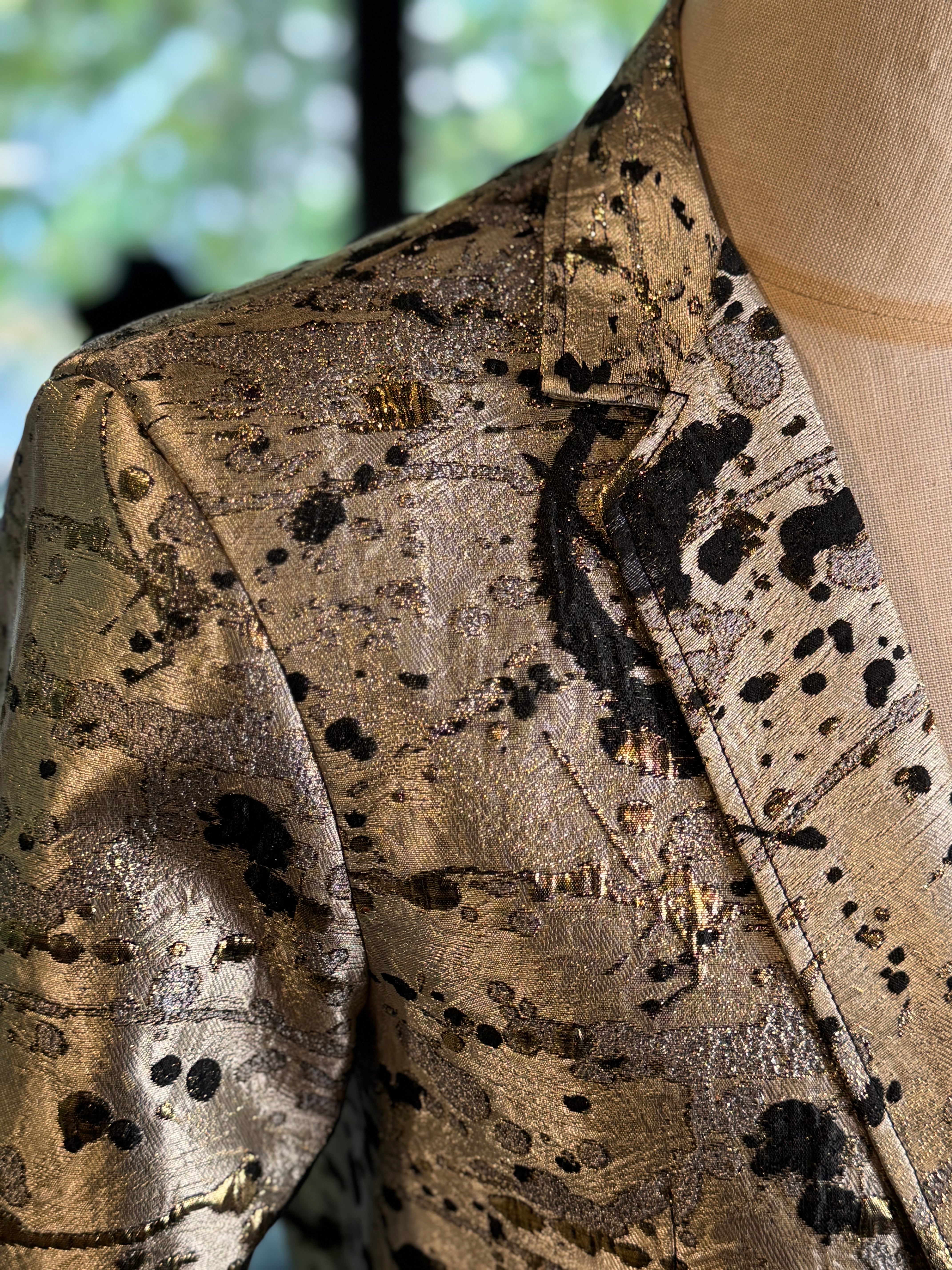 Saco dorado manchas