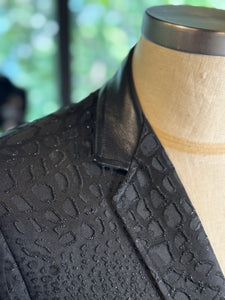 Saco negro reptil