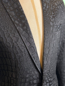 Saco negro reptil