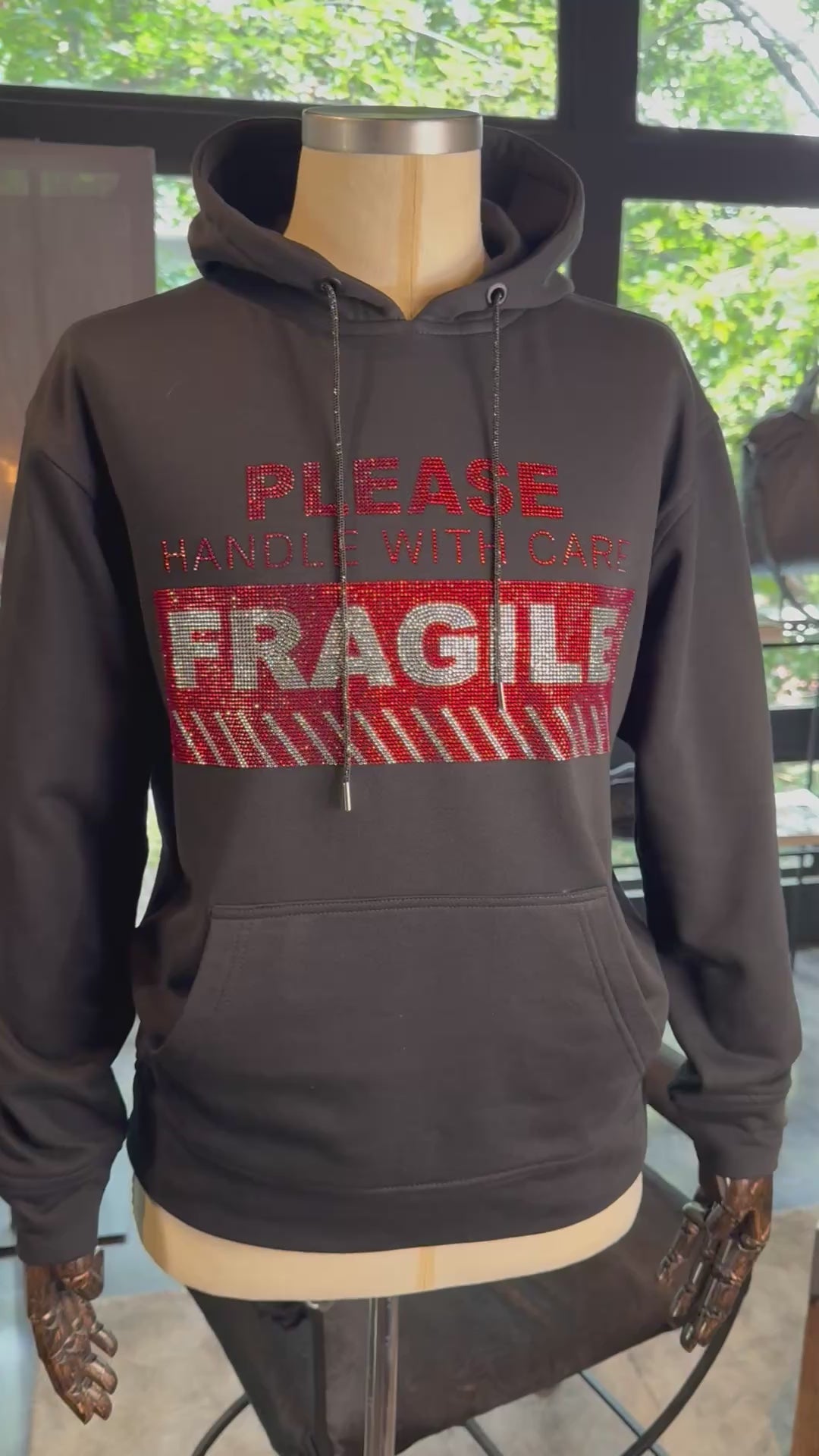 Sudadera frágil